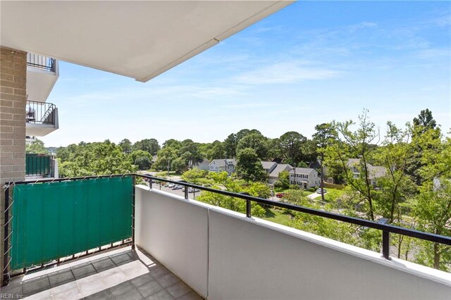 7320 Glenroie Ave Unit 5G, Norfolk, VA 23505 - balcony featuring view of wooded area
