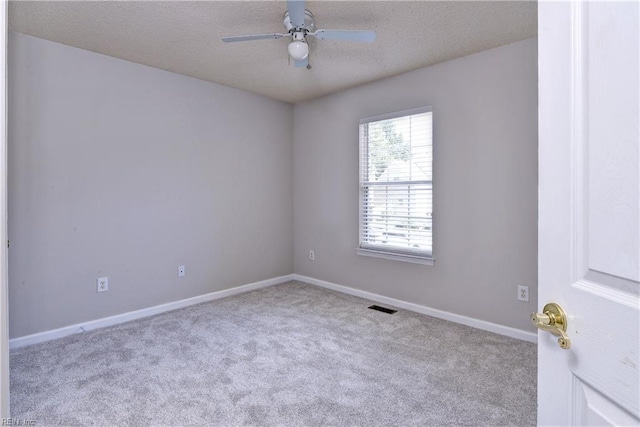 3957 Driftwood Way, Williamsburg, VA 23188 - unfurnished room featuring carpet, a textured ceiling, and ceiling fan