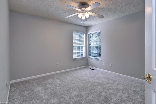 3957 Driftwood Way, Williamsburg, VA 23188 - carpeted spare room with a textured ceiling and ceiling fan