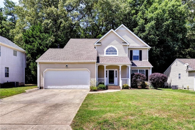 3957 Driftwood Way, Williamsburg, VA 23188 - traditional-style house featuring covered porch, concrete driveway, a garage, a front yard, and a shingled roof