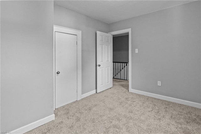 57 Locust Ave, Hampton, VA 23661 - unfurnished bedroom featuring carpet floors and baseboards