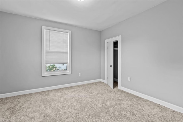 57 Locust Ave, Hampton, VA 23661 - unfurnished bedroom with carpet and baseboards