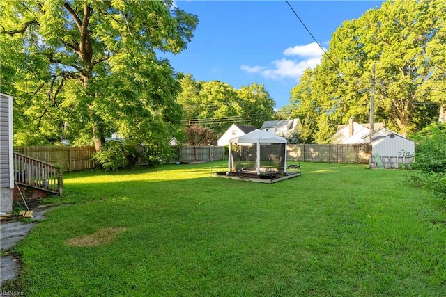 57 Locust Ave, Hampton, VA 23661 - fenced backyard featuring an outdoor structure