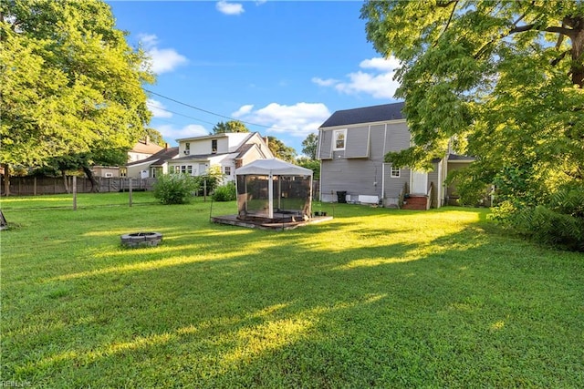 57 Locust Ave, Hampton, VA 23661 - view of yard featuring an outdoor fire pit, entry steps, and a gazebo