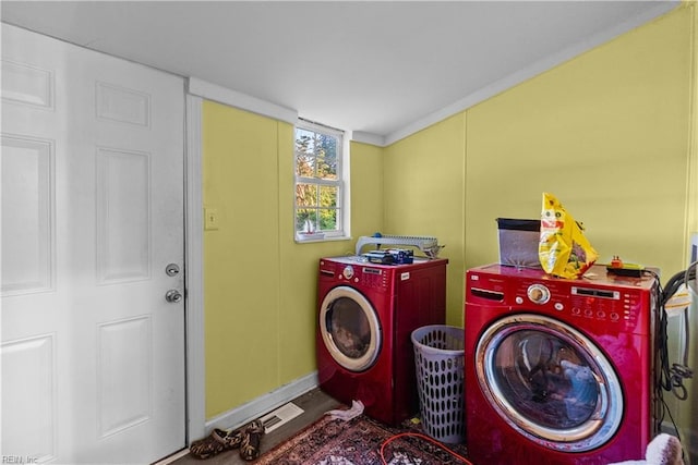 57 Locust Ave, Hampton, VA 23661 - laundry room featuring washer and dryer and baseboards