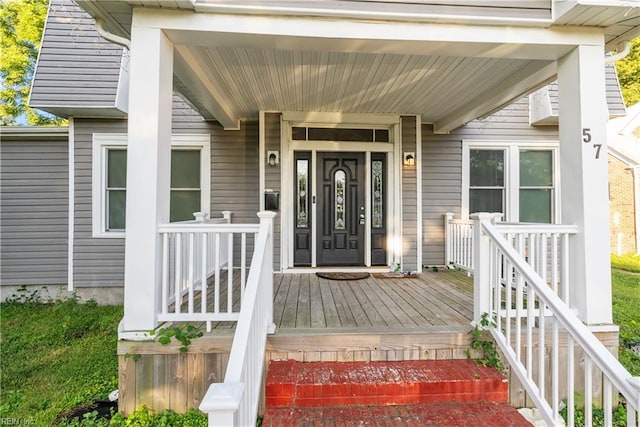 57 Locust Ave, Hampton, VA 23661 - view of exterior entry featuring covered porch