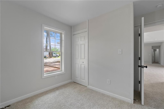 1320 Clay St, Franklin, VA 23851 - unfurnished bedroom featuring light carpet and a closet