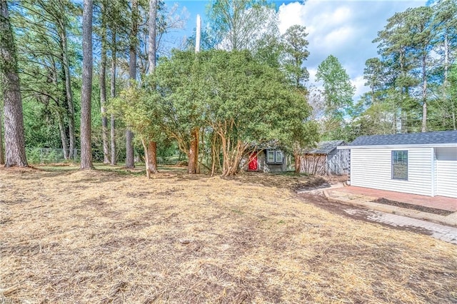1320 Clay St, Franklin, VA 23851 - view of yard featuring an outbuilding