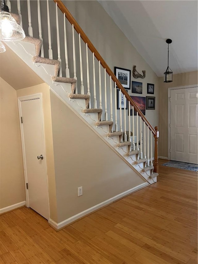 7656 The Points Pl, Gloucester Point, VA 23062 - stairway featuring wood finished floors and high vaulted ceiling
