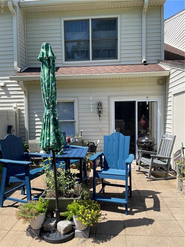 7656 The Points Pl, Gloucester Point, VA 23062 - rear view of house with a patio and outdoor dining space