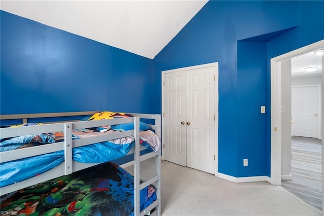 200 Burgundy Rd, Williamsburg, VA 23185 - carpeted bedroom featuring lofted ceiling and a closet