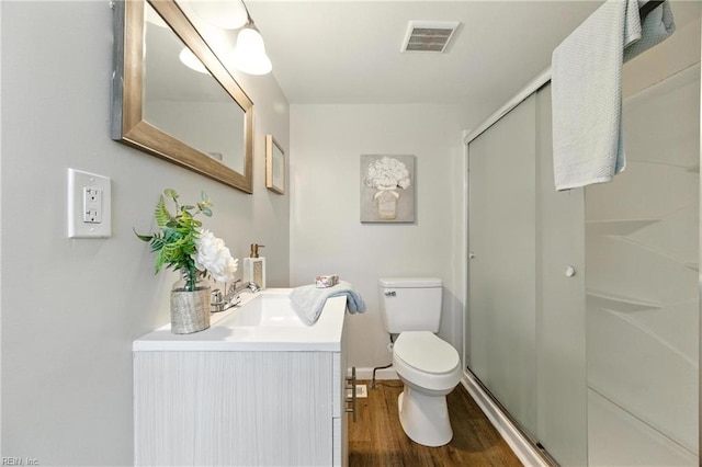 2007 Winfree Rd, Hampton, VA 23663 - bathroom featuring wood finished floors, a shower stall, and vanity