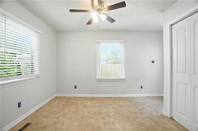 3559 Brest Ave, Norfolk, VA 23509 - spare room with healthy amount of natural light, ceiling fan, and a textured ceiling