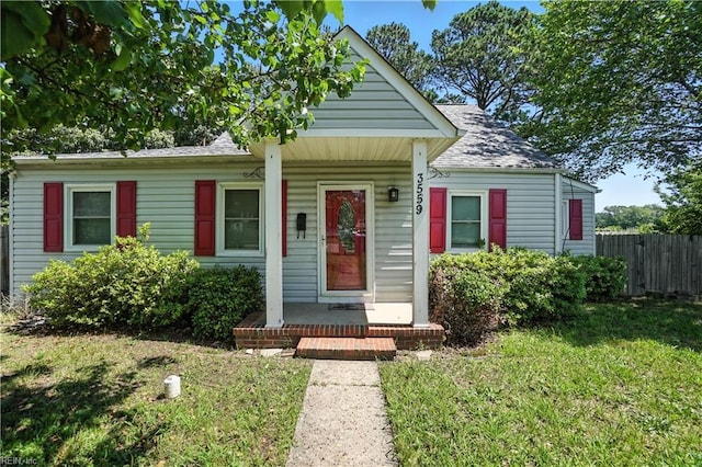 3559 Brest Ave, Norfolk, VA 23509 - bungalow-style home with a shingled roof and a porch