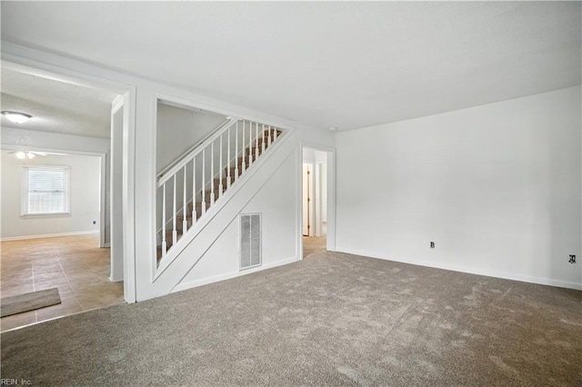 3559 Brest Ave, Norfolk, VA 23509 - unfurnished living room featuring stairway and carpet