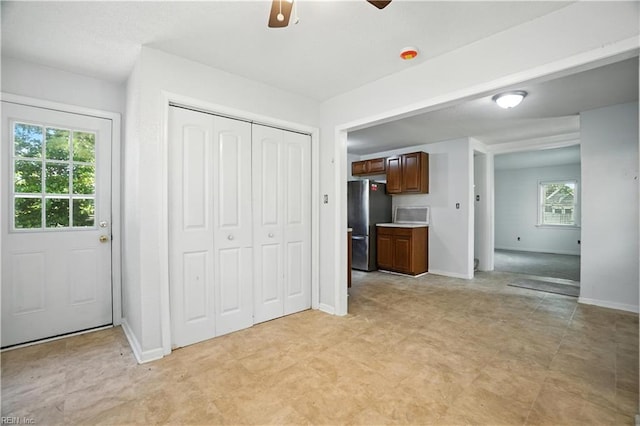 3559 Brest Ave, Norfolk, VA 23509 - unfurnished living room with a ceiling fan and baseboards