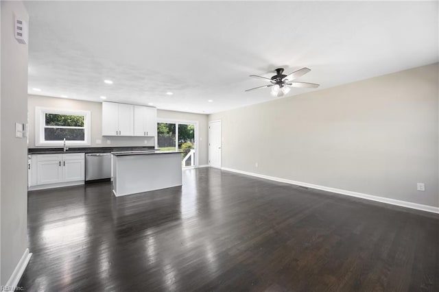 703 Terrace Dr, Newport News, VA 23601 - unfurnished living room featuring ceiling fan, dark wood-style floors, and recessed lighting