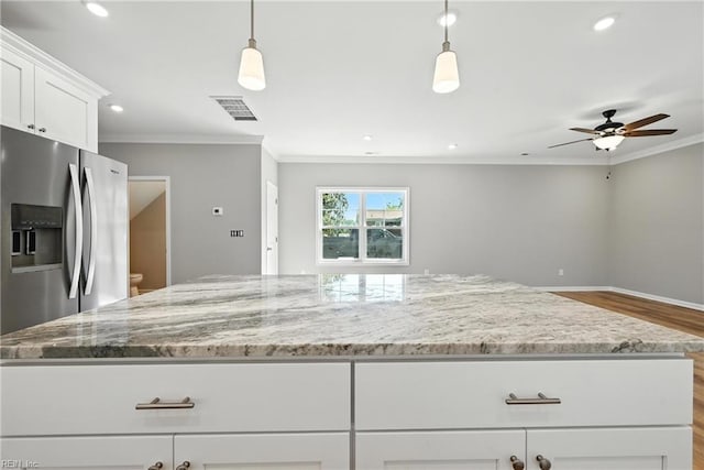 2152 Millville Rd, Chesapeake, VA 23323 - kitchen featuring dark wood finished floors, stainless steel fridge with ice dispenser, a center island, crown molding, and open floor plan