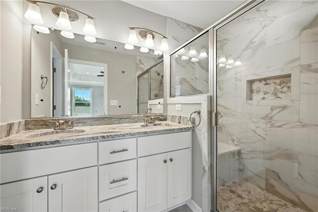 2152 Millville Rd, Chesapeake, VA 23323 - bathroom featuring double vanity and a marble finish shower