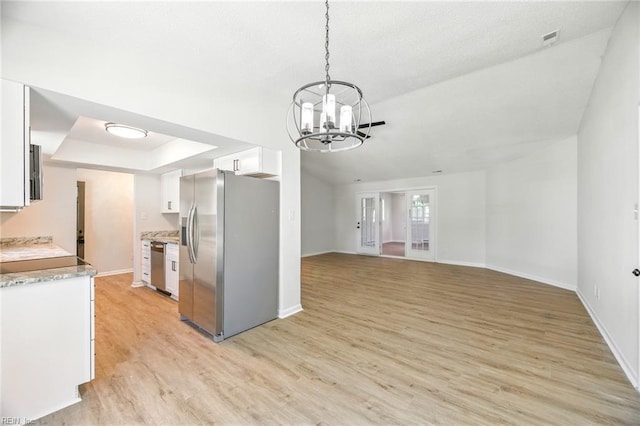 1409 Amberley Forest Rd, Virginia Beach, VA 23453 - kitchen featuring stainless steel appliances, a chandelier, light wood-type flooring, and white cabinets
