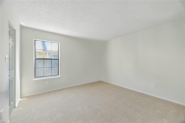 647 Crows Nest Ct, Virginia Beach, VA 23462 - spare room featuring carpet floors and a textured ceiling