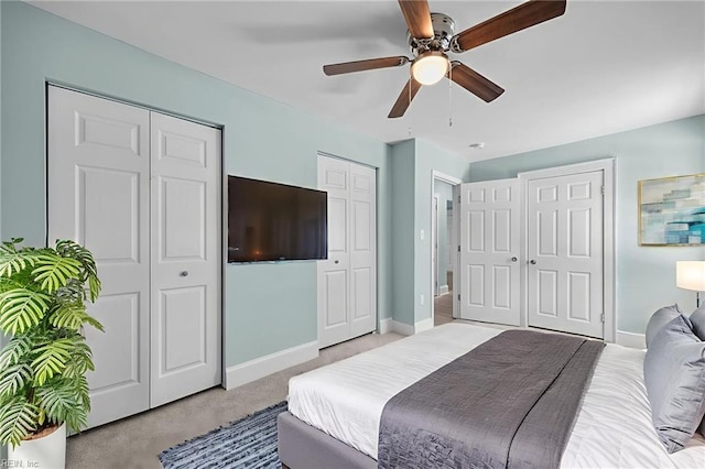 1003 Douglas Ave, Portsmouth, VA 23707 - carpeted bedroom with multiple closets and ceiling fan
