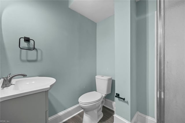1003 Douglas Ave, Portsmouth, VA 23707 - bathroom featuring wood finished floors and vanity
