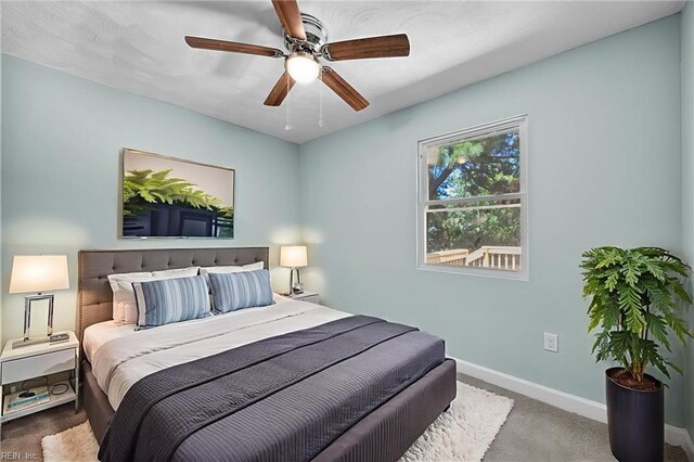 1003 Douglas Ave, Portsmouth, VA 23707 - carpeted bedroom featuring baseboards and ceiling fan