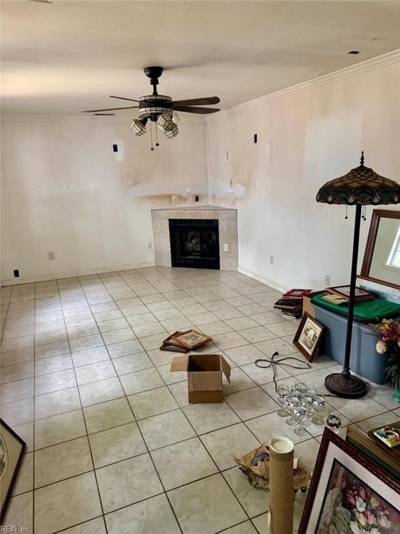 2609 Harling Dr, Chesapeake, VA 23325 - unfurnished living room featuring light tile patterned floors, a ceiling fan, a fireplace, and crown molding