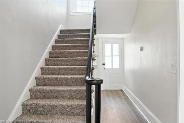 227 N Saratoga St, Suffolk, VA 23434 - stairway with wood finished floors and healthy amount of natural light