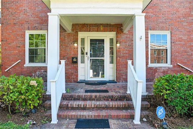 227 N Saratoga St, Suffolk, VA 23434 - view of exterior entry featuring brick siding