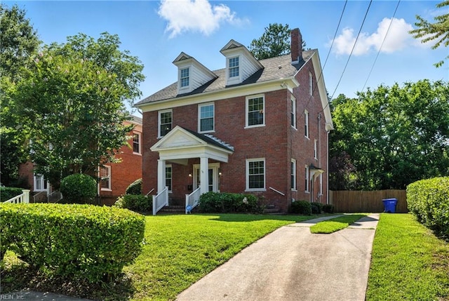227 N Saratoga St, Suffolk, VA 23434 - view of front facade with brick siding and a chimney
