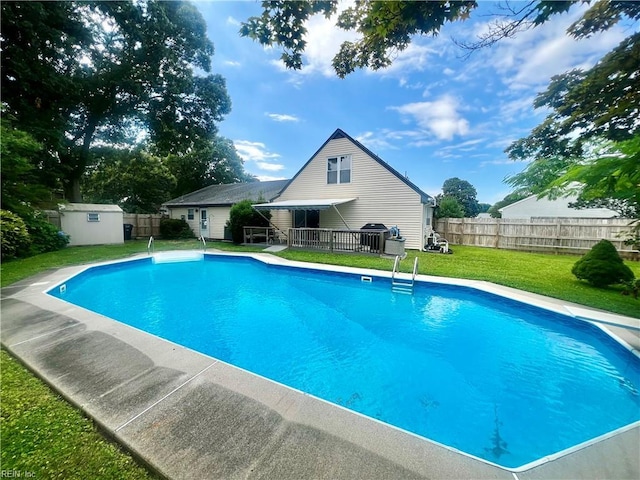 600 Cambria Ct, Virginia Beach, VA 23455 - view of swimming pool with a fenced backyard, a storage shed, and a wooden deck