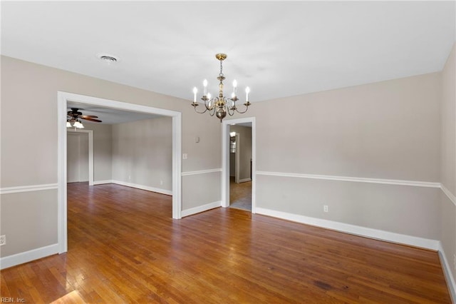 416 N Broad St, Suffolk, VA 23434 - spare room with a chandelier, wood finished floors, and a ceiling fan