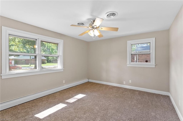 416 N Broad St, Suffolk, VA 23434 - empty room with baseboard heating, carpet flooring, and a ceiling fan