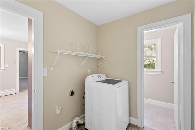 416 N Broad St, Suffolk, VA 23434 - washroom with washer / clothes dryer and light tile patterned flooring
