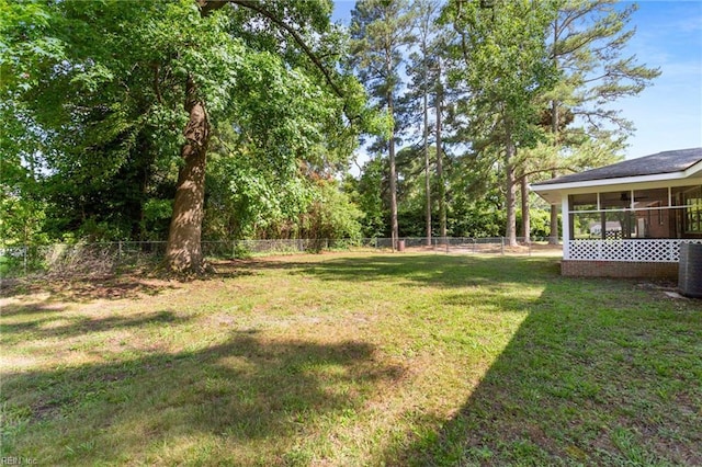 416 N Broad St, Suffolk, VA 23434 - fenced backyard with a sunroom