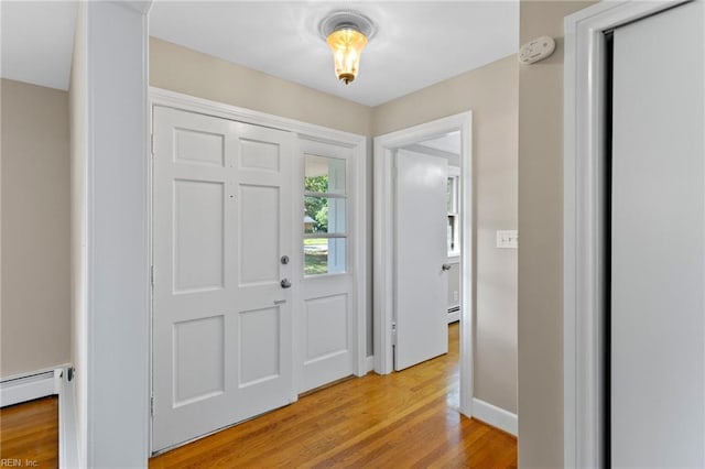416 N Broad St, Suffolk, VA 23434 - foyer entrance featuring light wood-style flooring and baseboards