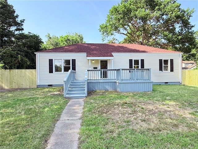 200 W Ocean Ave, Norfolk, VA 23503 - view of front of home with crawl space, a wooden deck, and a shingled roof
