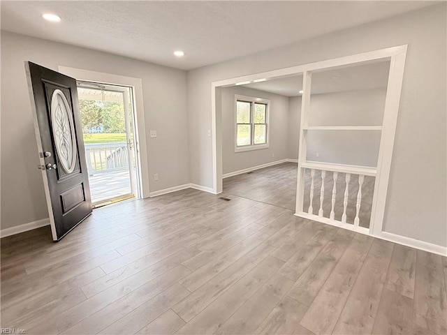 200 W Ocean Ave, Norfolk, VA 23503 - entrance foyer with wood finished floors and recessed lighting