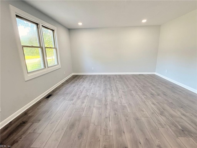 200 W Ocean Ave, Norfolk, VA 23503 - empty room featuring wood finished floors and recessed lighting