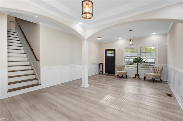 316 A Pocahontas Ave, Franklin, VA 23851 - entrance foyer with arched walkways, light wood-style flooring, wainscoting, stairs, and recessed lighting