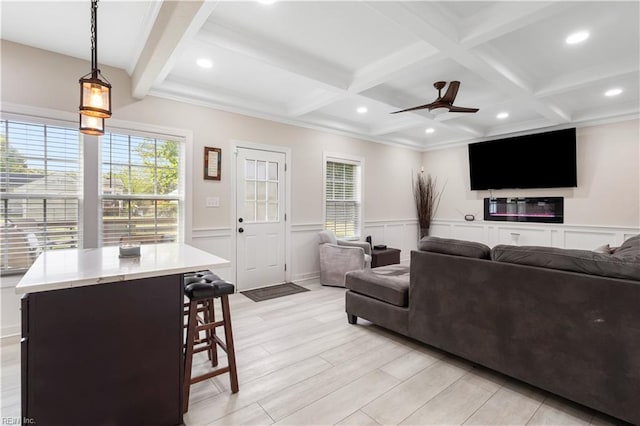 316 A Pocahontas Ave, Franklin, VA 23851 - living area featuring ceiling fan, beamed ceiling, coffered ceiling, and a decorative wall
