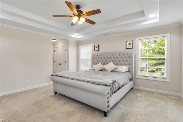 316 A Pocahontas Ave, Franklin, VA 23851 - bedroom with ornamental molding, a tray ceiling, light colored carpet, and ceiling fan