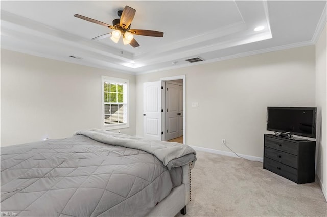 316 A Pocahontas Ave, Franklin, VA 23851 - bedroom with a tray ceiling, ornamental molding, light colored carpet, and a ceiling fan