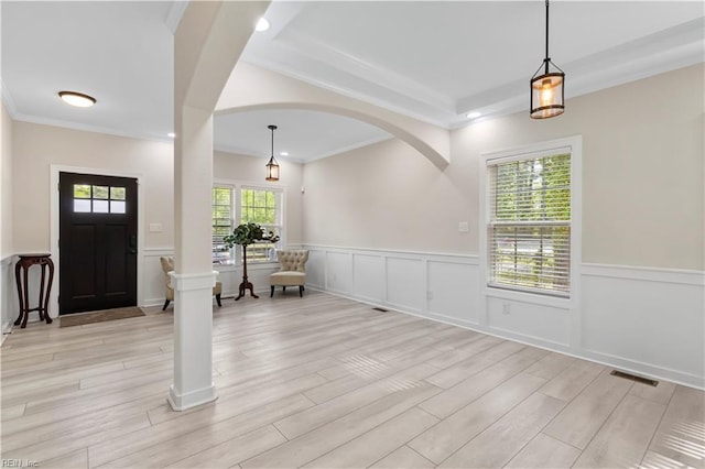 316 A Pocahontas Ave, Franklin, VA 23851 - foyer with wainscoting, ornamental molding, light wood finished floors, and a decorative wall
