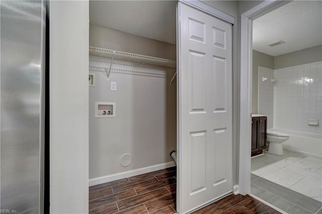 3856 Lasalle Dr Unit 107, Virginia Beach, VA 23453 - laundry area featuring washer hookup and wood finished floors