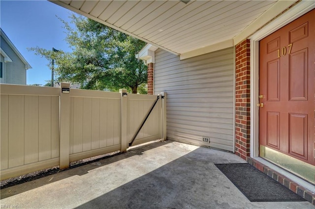 3856 Lasalle Dr Unit 107, Virginia Beach, VA 23453 - view of patio featuring a gate