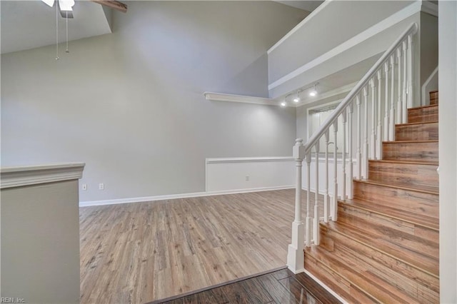 3856 Lasalle Dr Unit 107, Virginia Beach, VA 23453 - stairs featuring ceiling fan, wood finished floors, and rail lighting