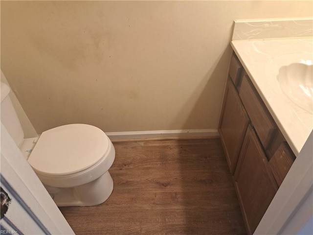 812 Liberal Arts Ct, Virginia Beach, VA 23462 - half bath featuring vanity and wood finished floors